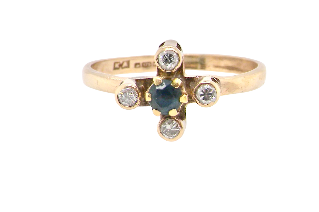 A 9 carat gold sapphire and diamond ring