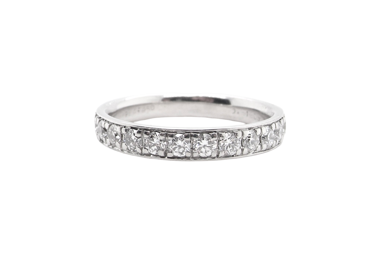 A platinum half hoop diamond eternity ring
