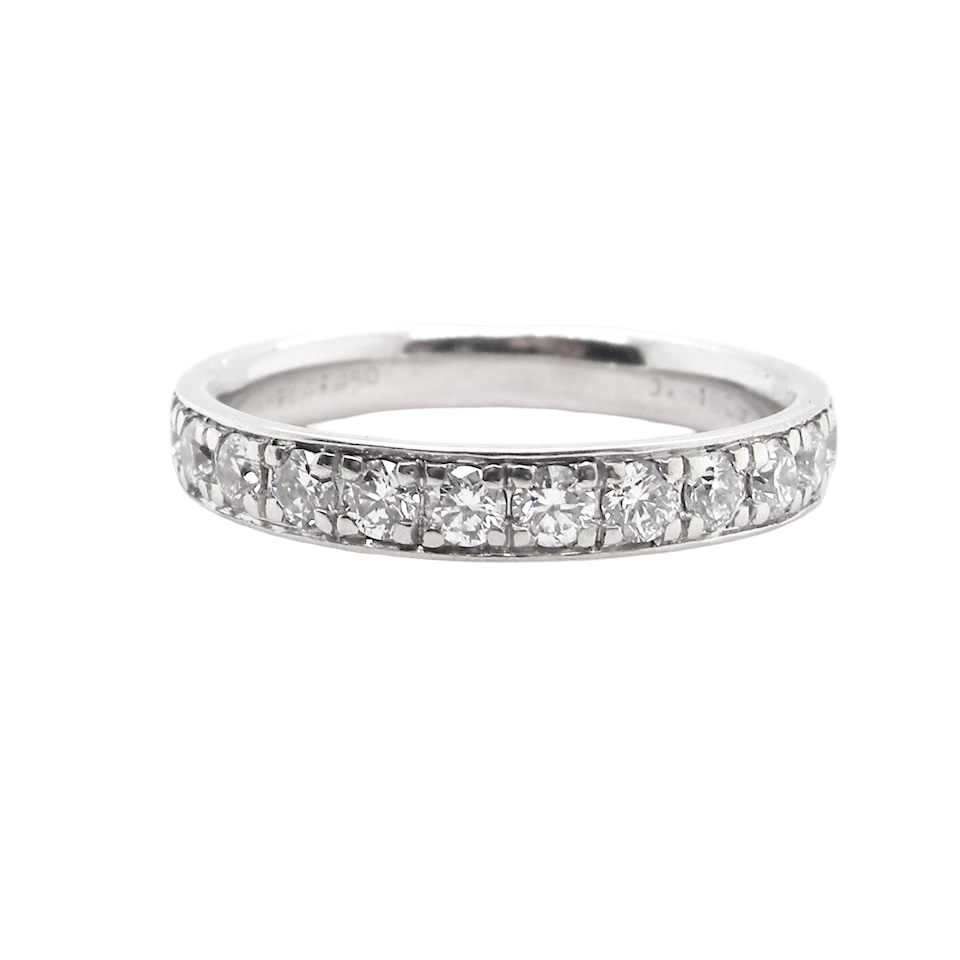 A platinum half hoop diamond eternity ring