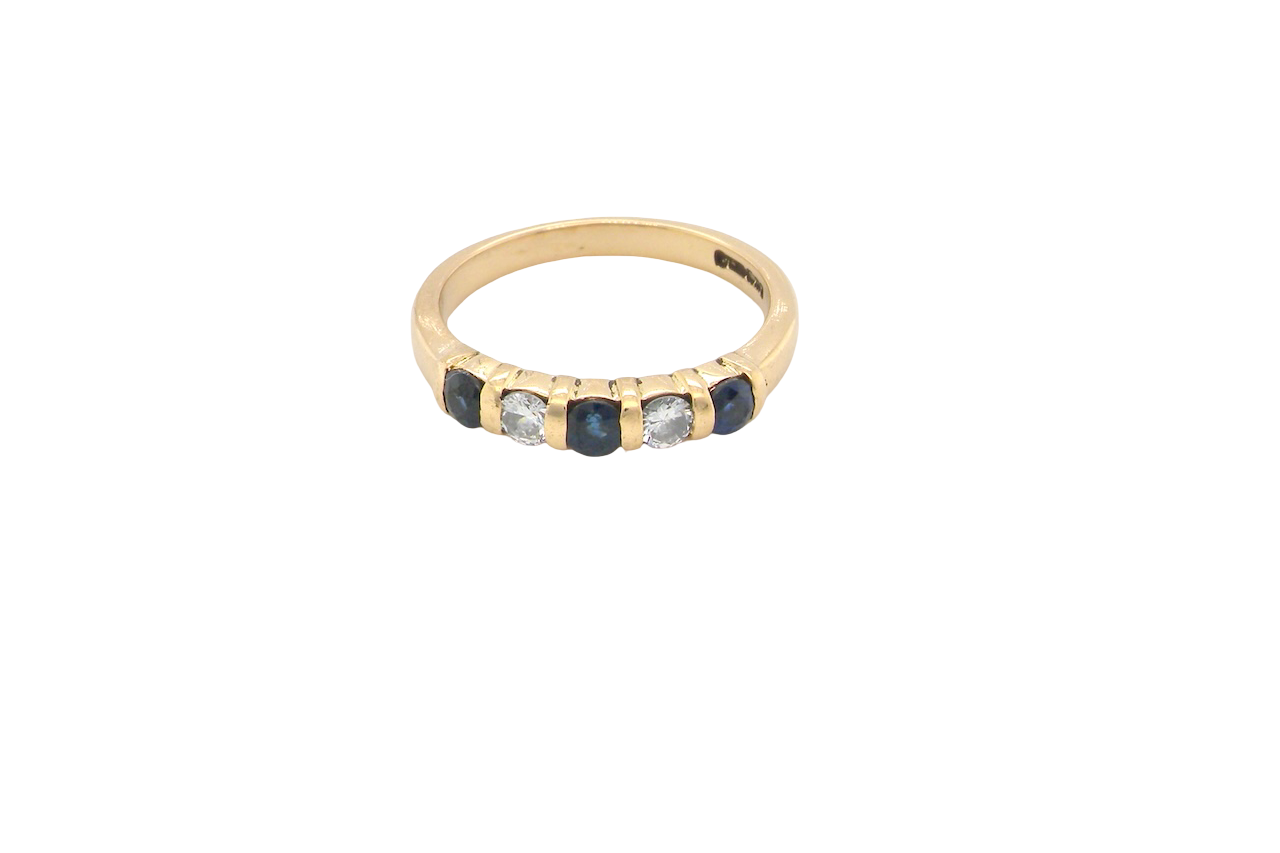 18-carat gold half-hoop eternity ring, set with three round sapphires