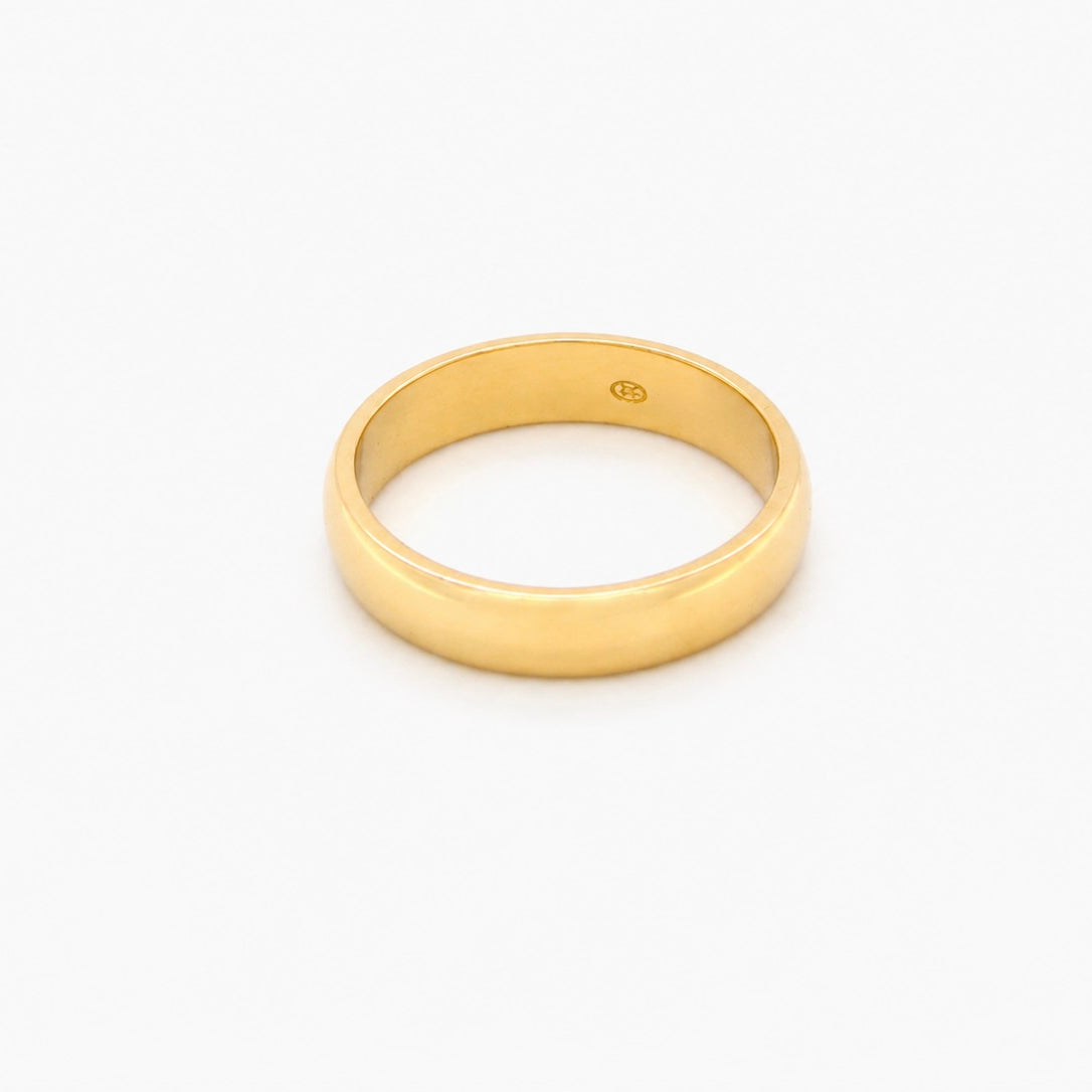 A traditional 18 carat gold wedding ring. D shape profile.
Substantial weight at 5.6grams