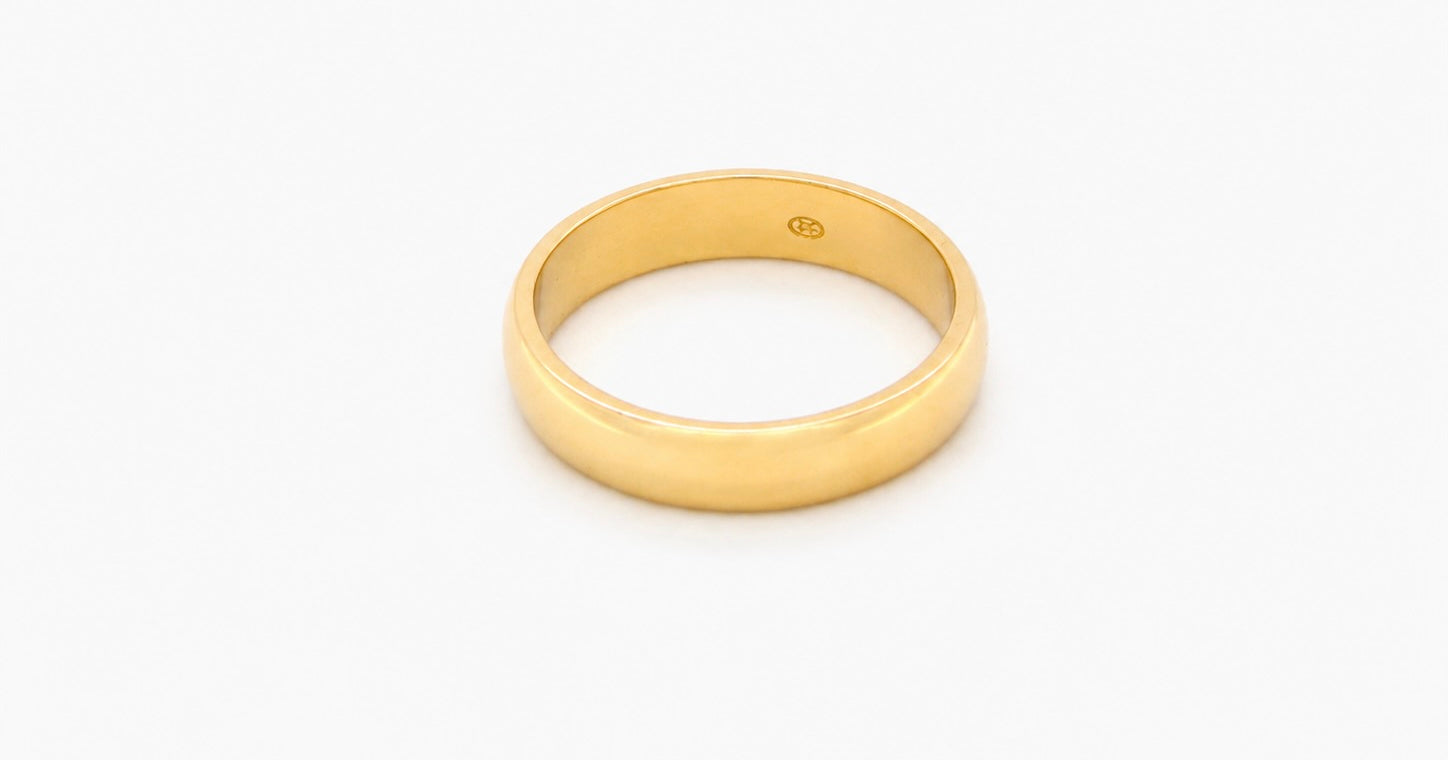 A traditional 18 carat gold wedding ring. D shape profile.
Substantial weight at 5.6grams