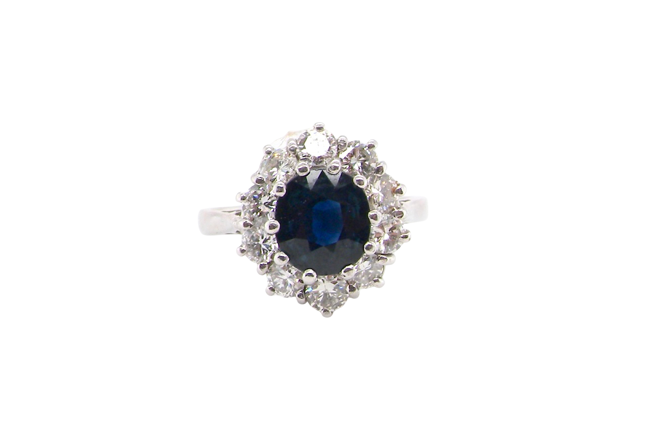 1970s A traditional sapphire and diamond cluster ring
