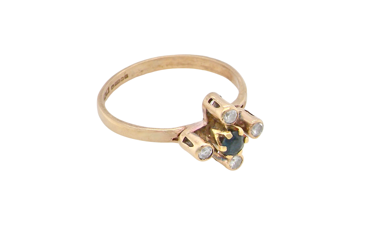 A 9 carat gold sapphire and diamond ring