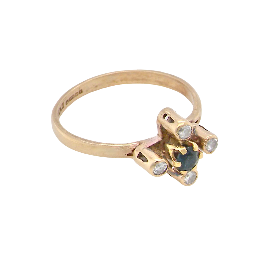 A 9 carat gold sapphire and diamond ring