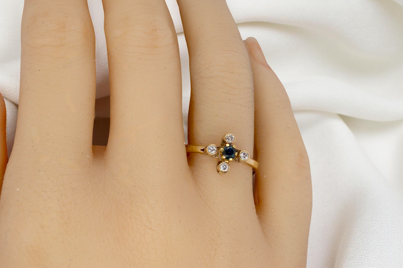 A 9 carat gold sapphire and diamond ring