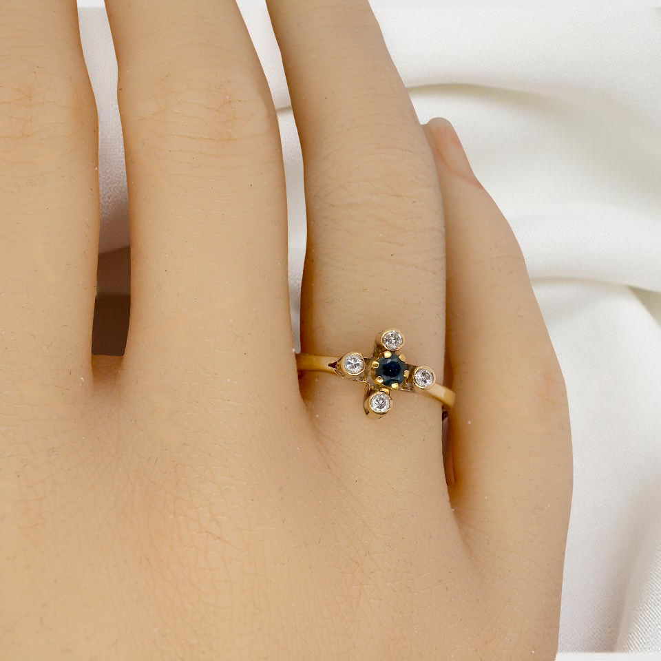 A 9 carat gold sapphire and diamond ring