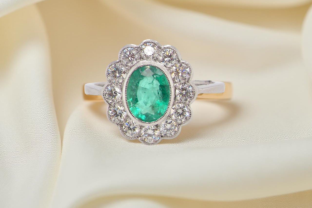 A fabulous Emerald and Diamond cluster ring