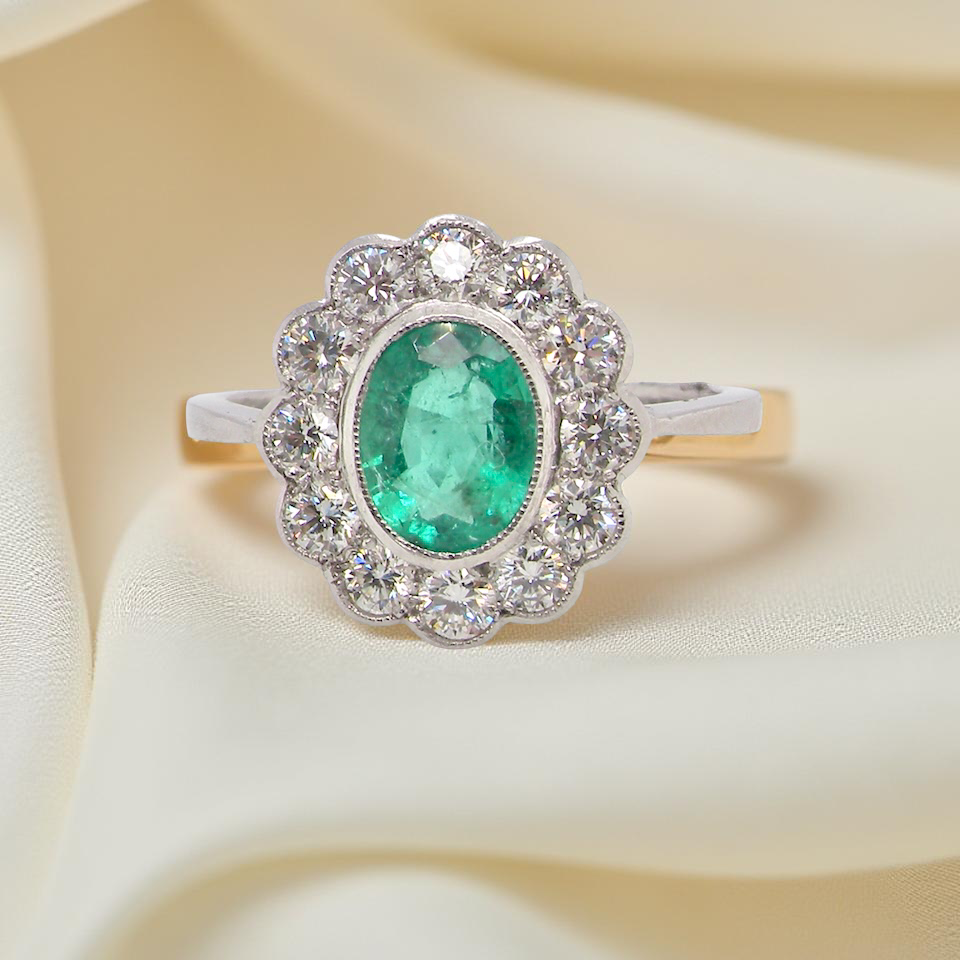 A fabulous Emerald and Diamond cluster ring