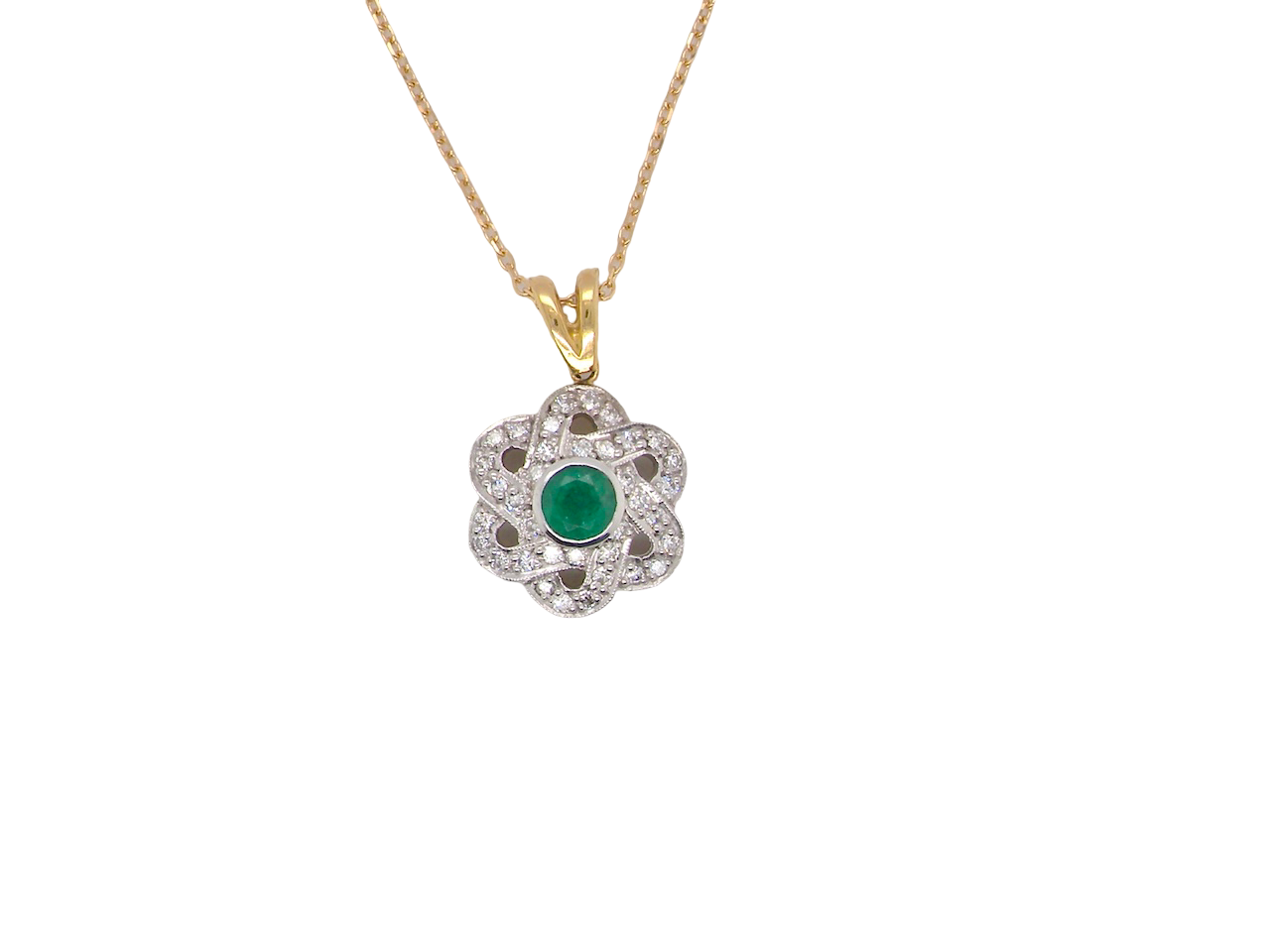 8 carat gold pendant that features to the centre a round emerald