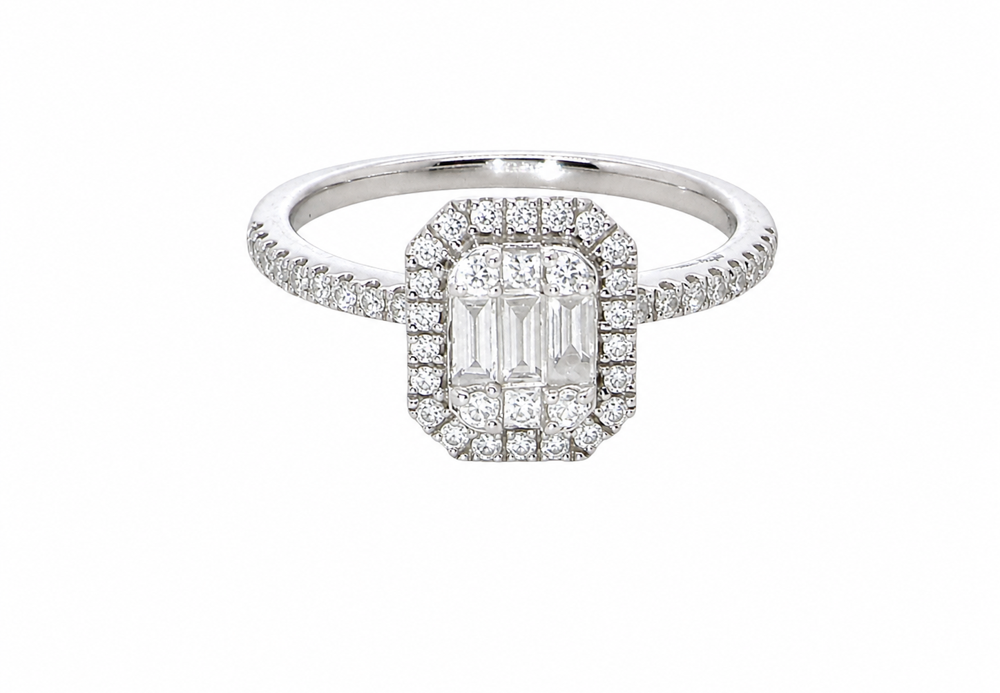 A rectangular diamond cluster ring. Centre portion is set with three baguette cut white diamonds 3x1.6mm and six mixed cut diamonds 2mm each.
Surrounded by a halo of twenty two small round diamonds
