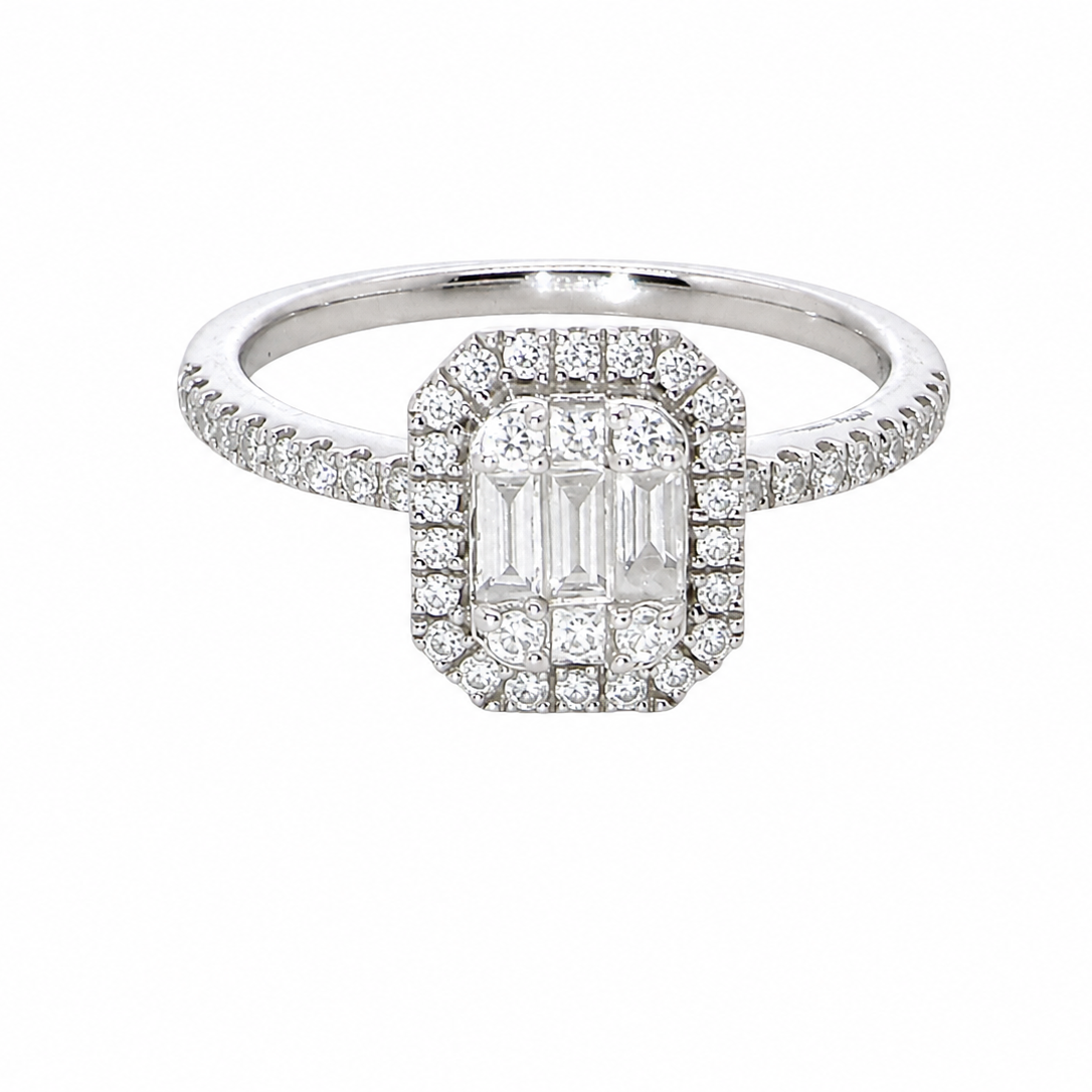A rectangular diamond cluster ring. Centre portion is set with three baguette cut white diamonds 3x1.6mm and six mixed cut diamonds 2mm each.
Surrounded by a halo of twenty two small round diamonds