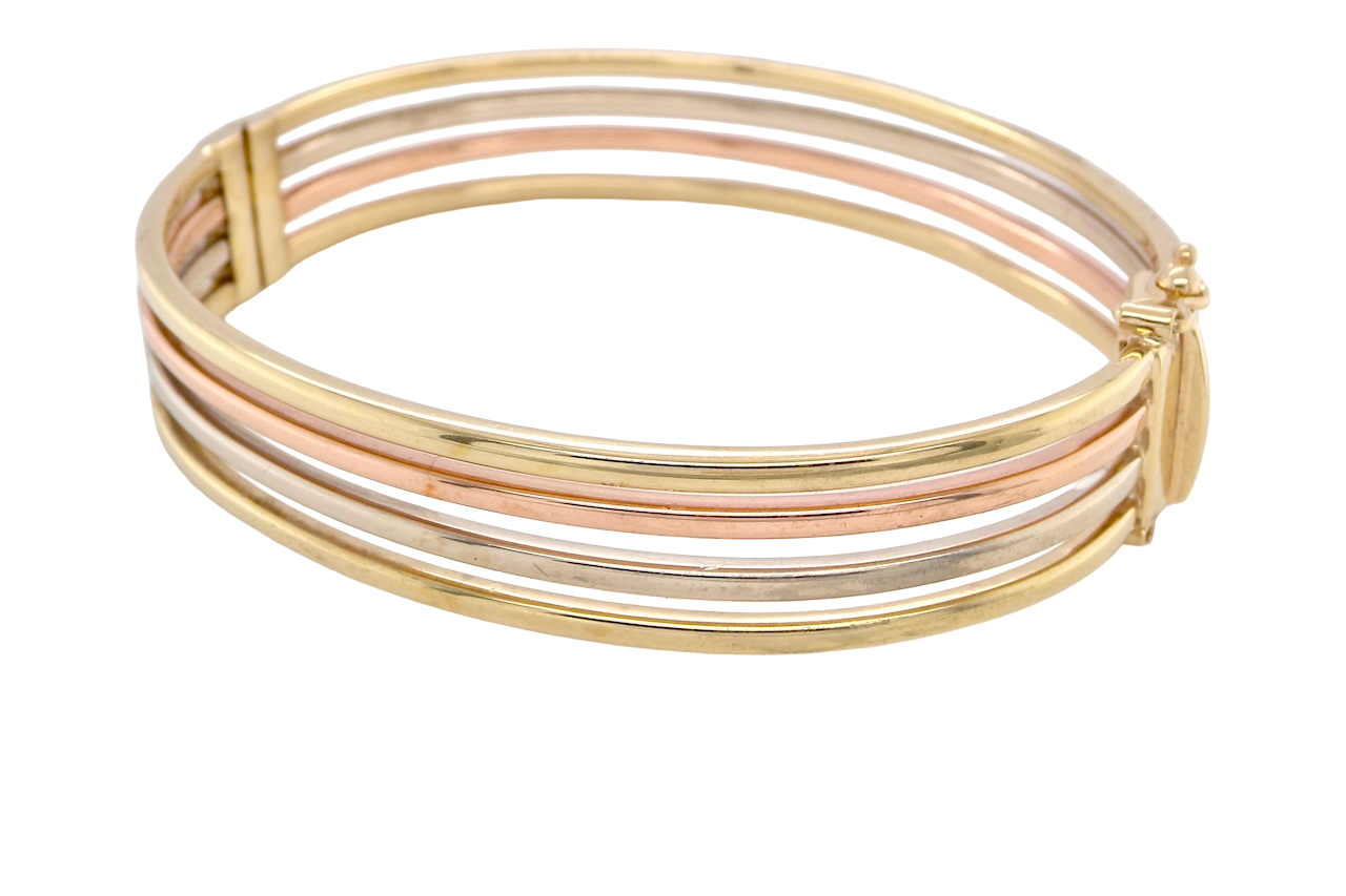 9 carat gold bangle. Solid bands of rose, yellow and white gold