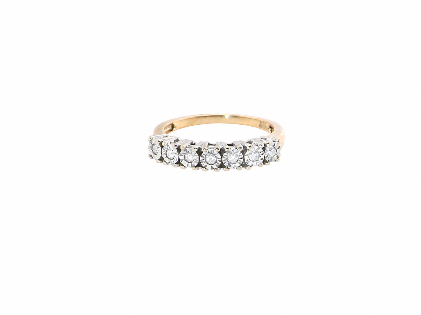 9 carat gold half hoop eternity ring.
Set with seven small white diamonds, each 1.8mm within an illusion setting that is 3.8mm in diameter, and white gold. 