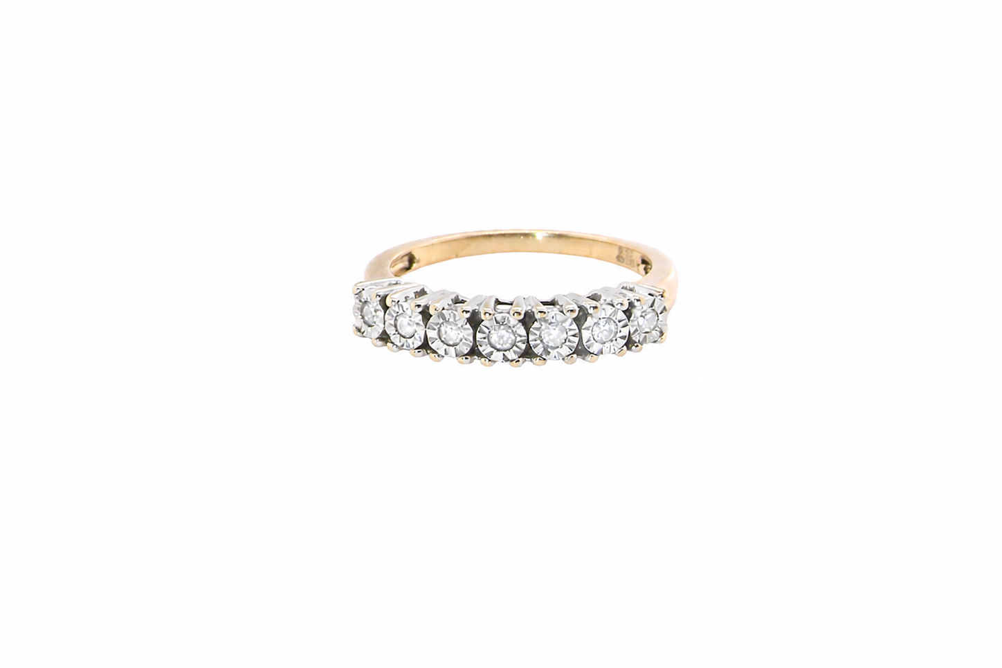 9 carat gold half hoop eternity ring.
Set with seven small white diamonds, each 1.8mm within an illusion setting that is 3.8mm in diameter, and white gold. 