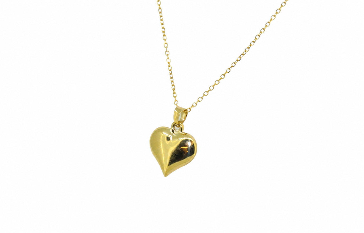 A 9ct gold patterned heart pendant reverse view