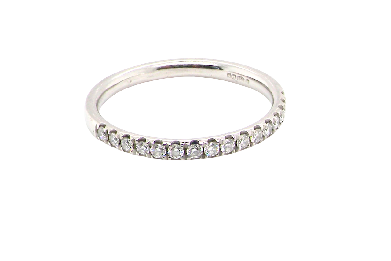 A Platinum Half Hoop Diamond Eternity Ring