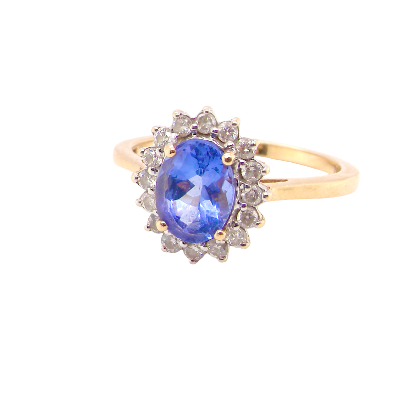 A 14 carat gold cluster ring. Features to the centre an oval cut cornflower blue sapphire, 8x6mm (, four claw setting.