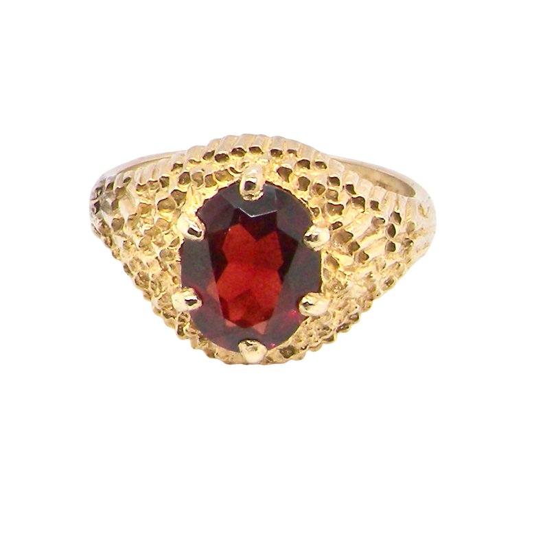 A 1970s dress ring set with an oval garnet stone. This measures 10x8mm