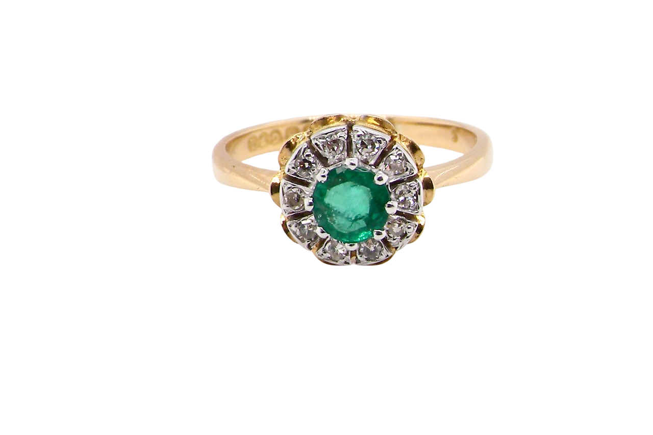 A 1980's Emerald and Diamond ring