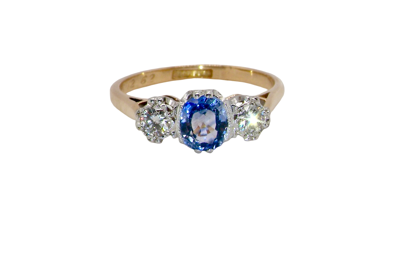 A 3 stone sapphire and diamond ring-A