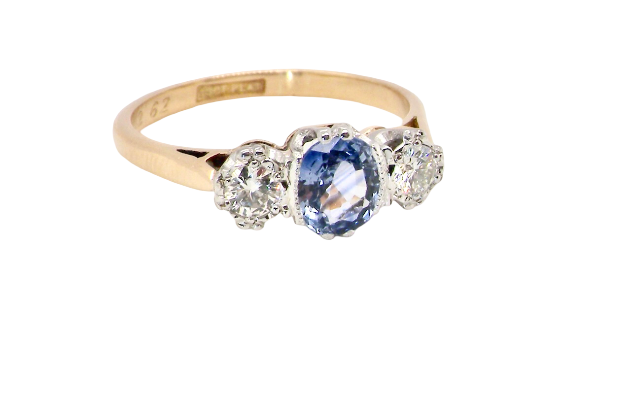 A 3 stone sapphire and diamond ring-B
