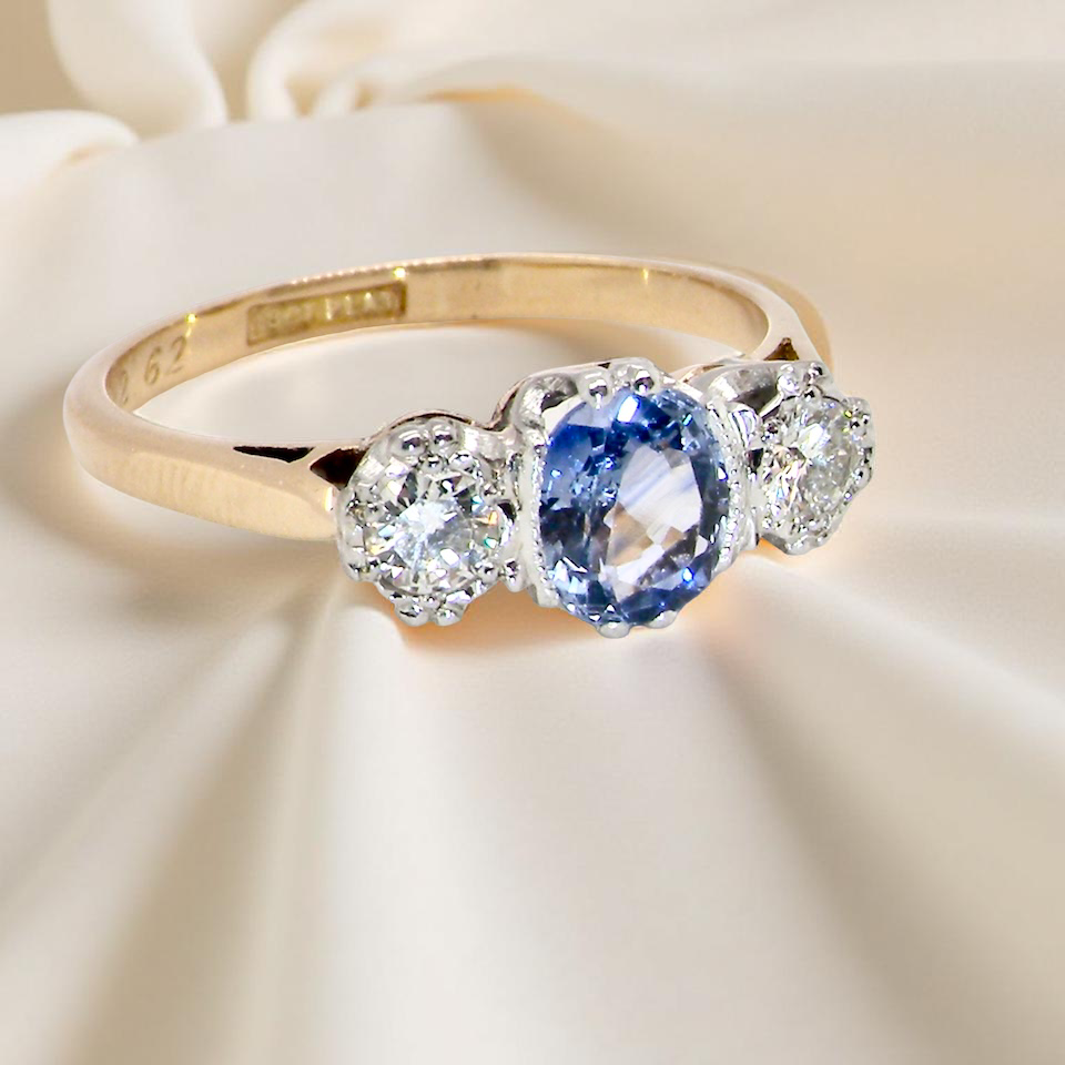 A 3 stone sapphire and diamond ring-C