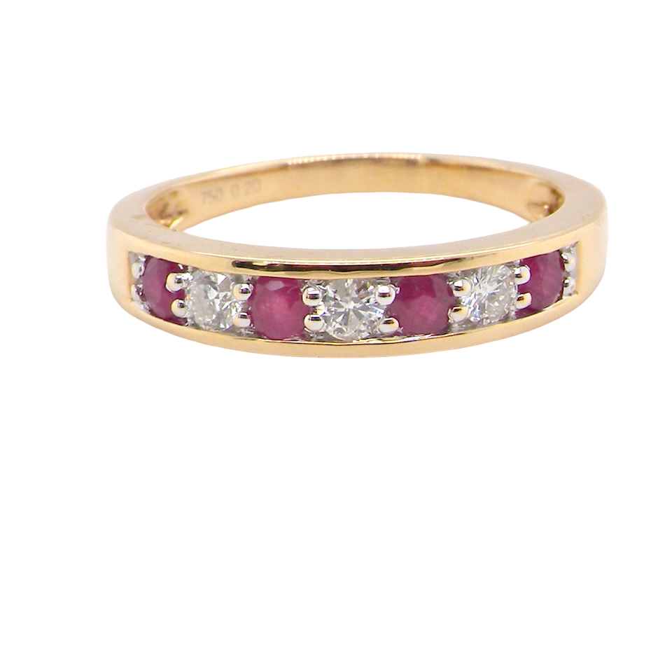 A seven stone Ruby and Diamond eternity ring