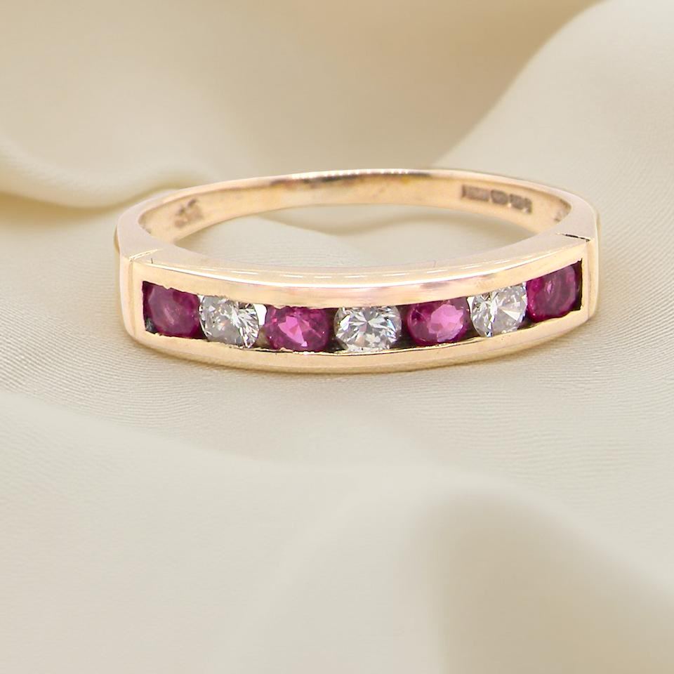 A 9 carat Yellow Gold Ruby & Diamond Eternity Ring