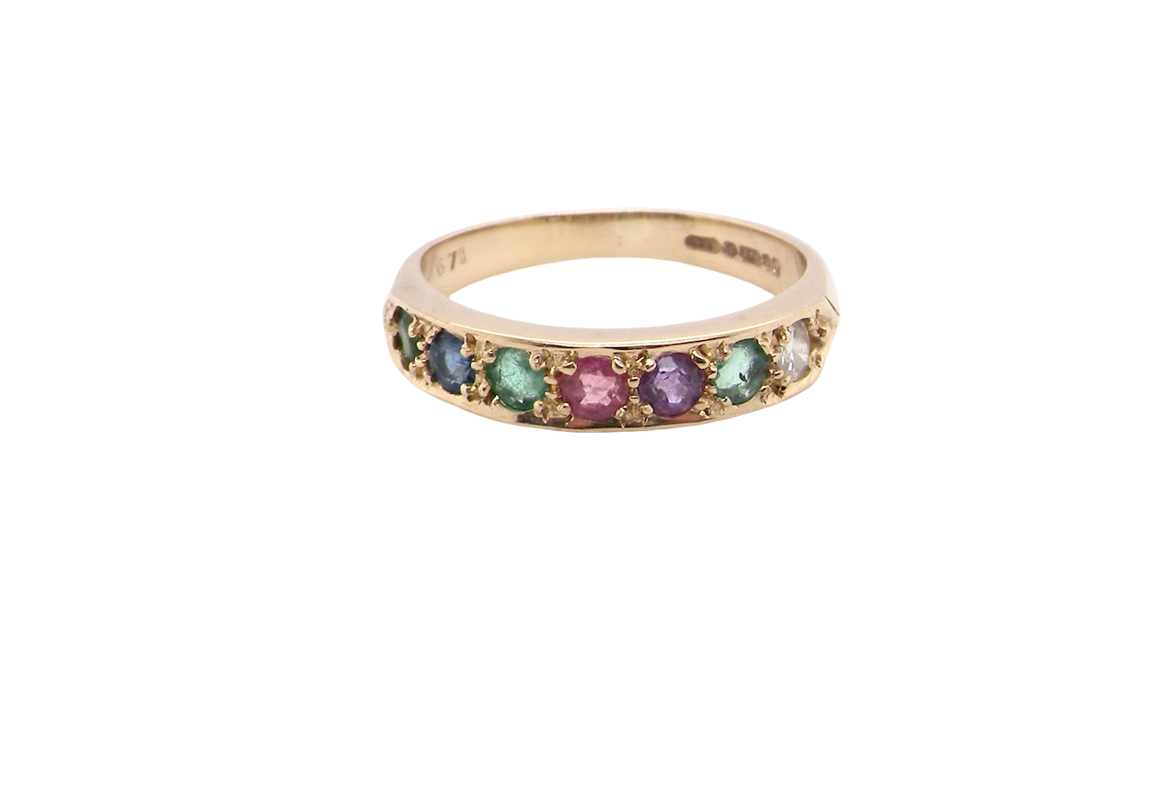A 9 carat gold acrostic dress ring, set with various gemstones the initials of each spelling the word DEAREST.