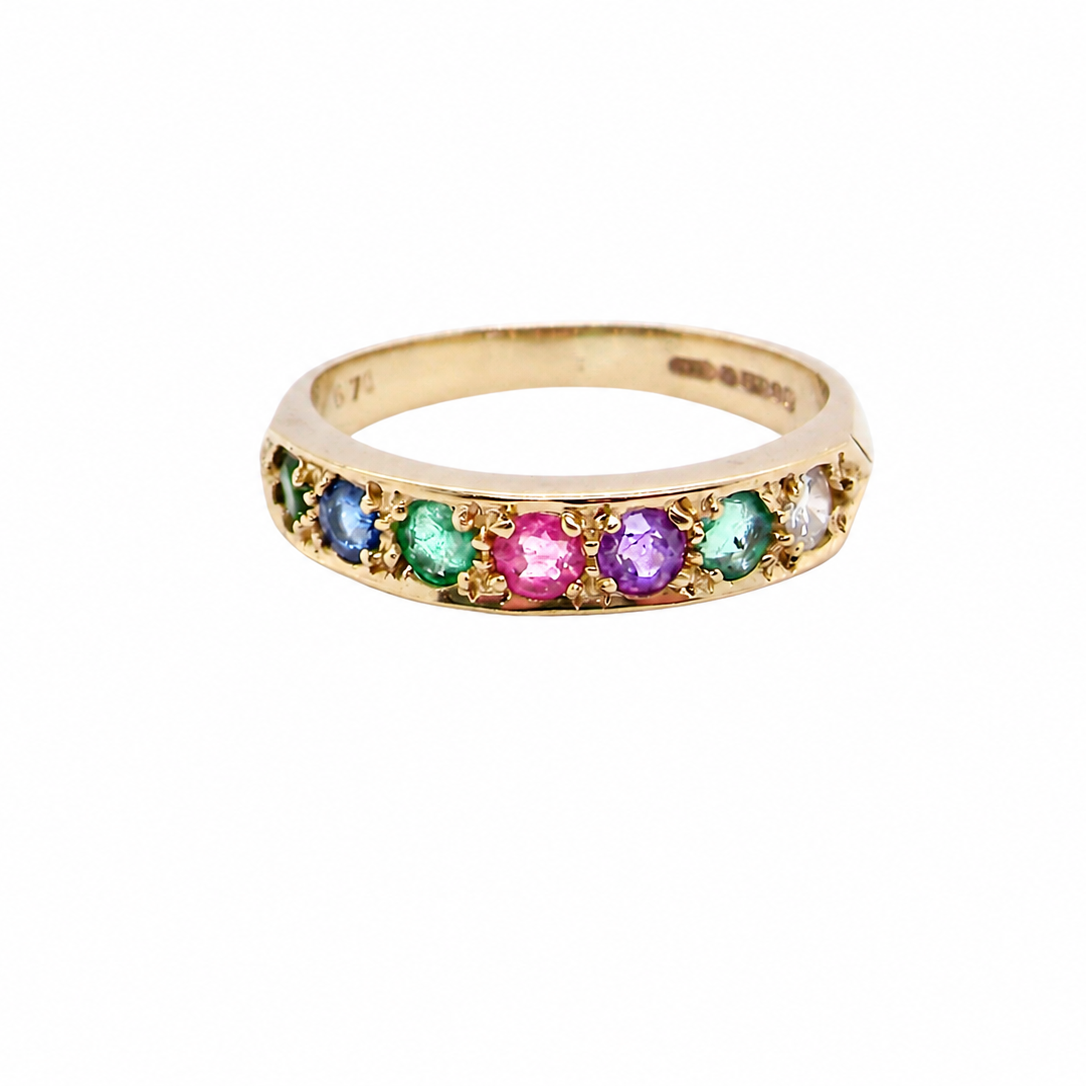 A 9 carat gold acrostic dress ring, set with various gemstones