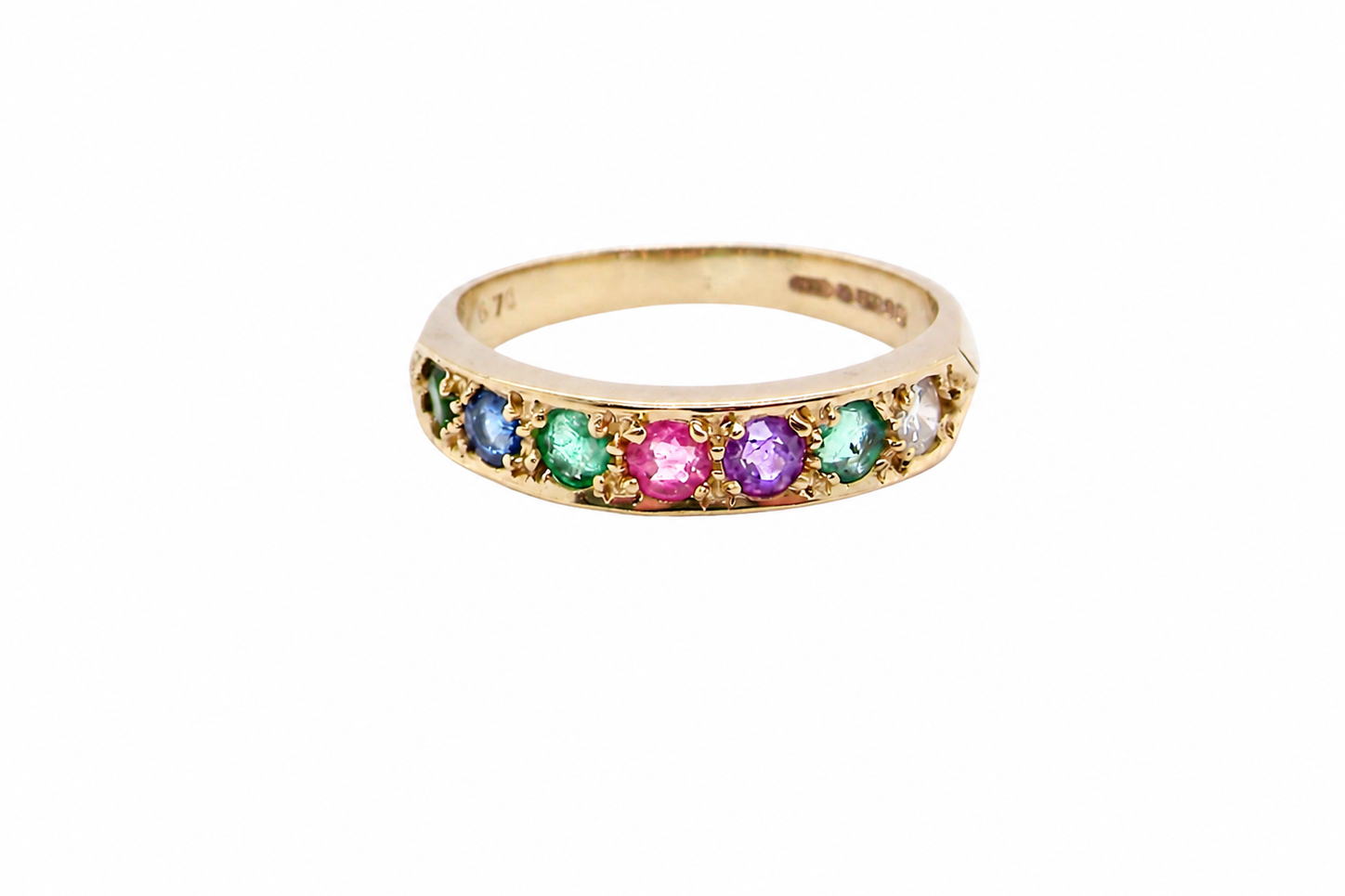 A 9 carat gold acrostic dress ring, set with various gemstones