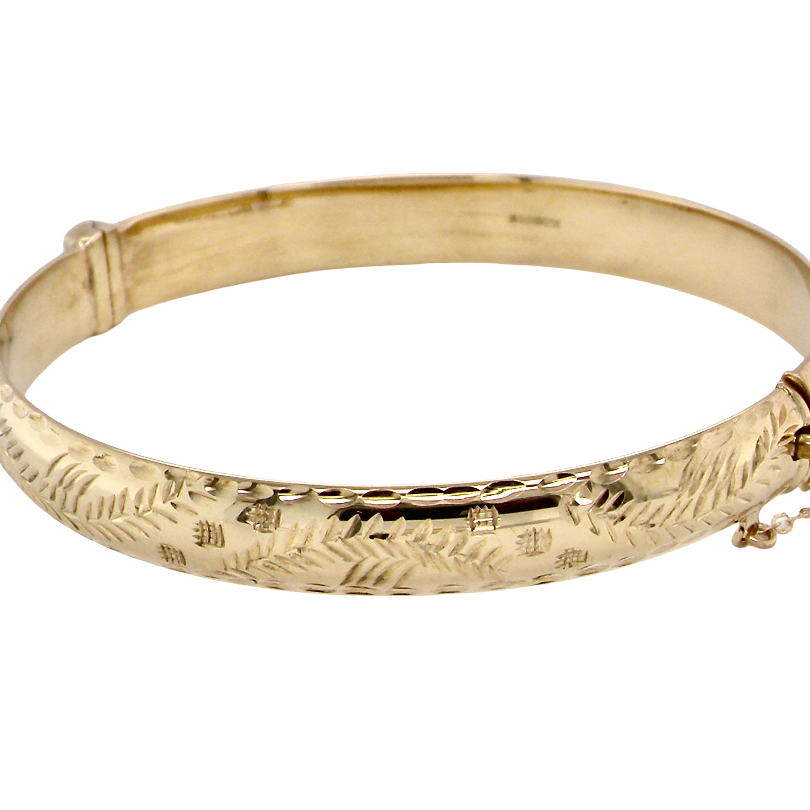 A 9 carat gold bangle. A traditional British design,