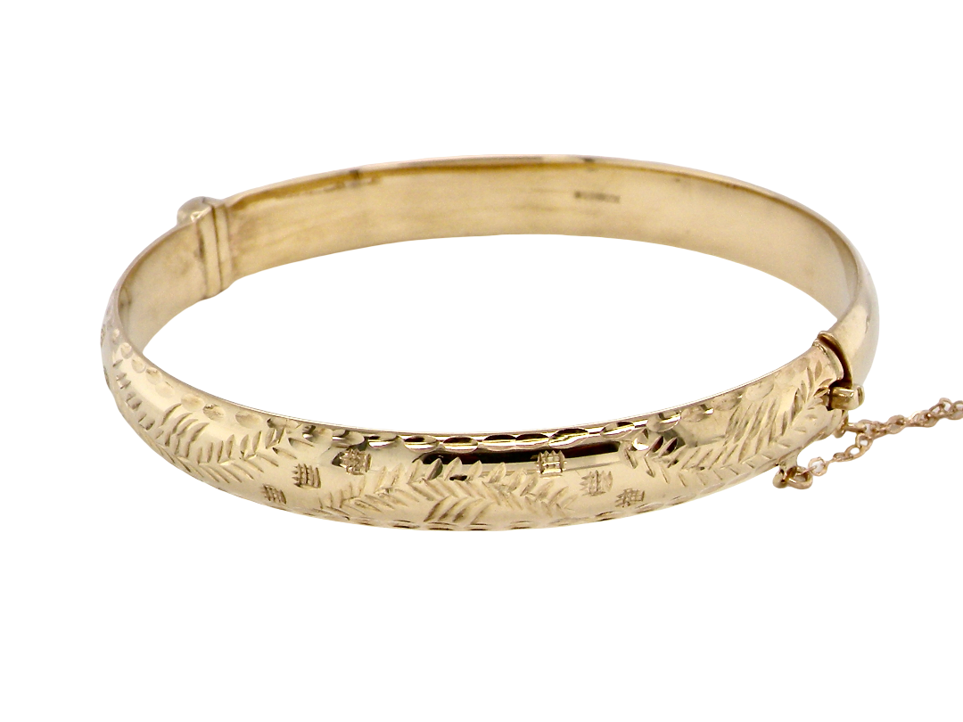 A 9 carat gold bangle. A traditional British design,