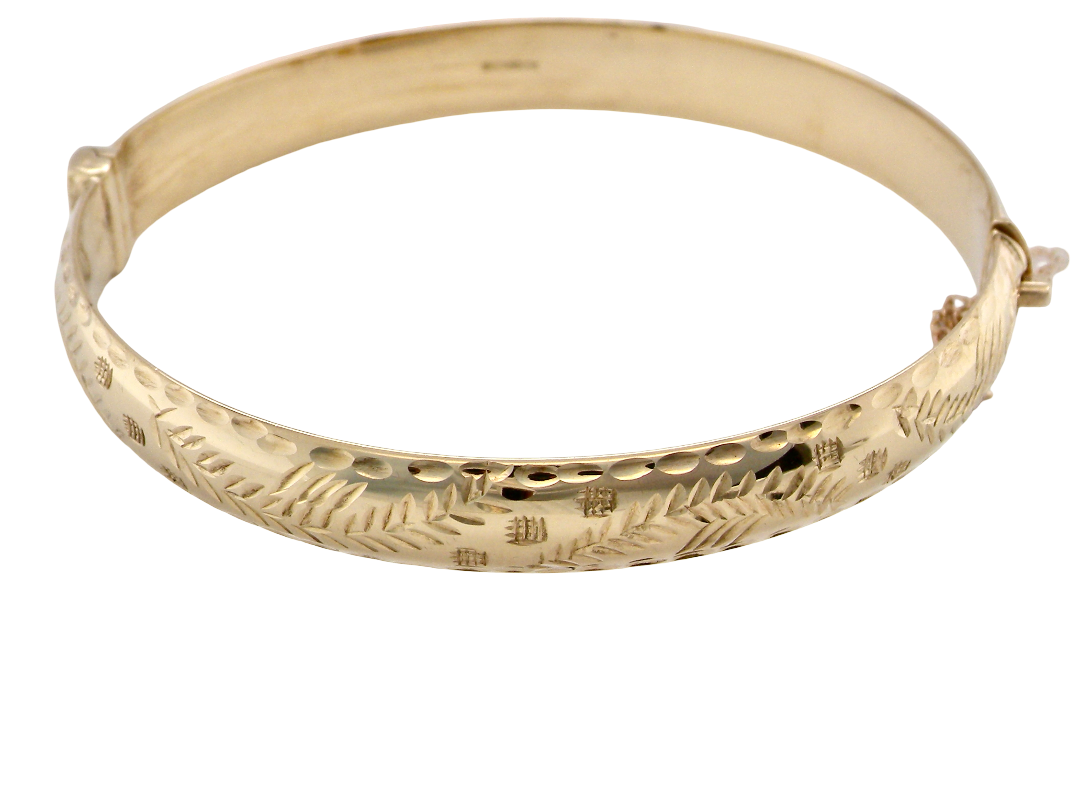 A vintage gold bangle bracelet with engraved leaf patterns and a hammered texture, shown on a plain white background.