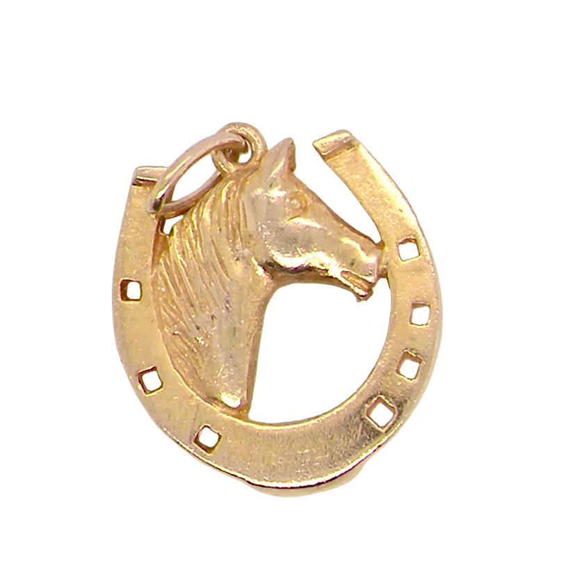 A 9 carat gold charm in the shape of a horseshoe with a horses head