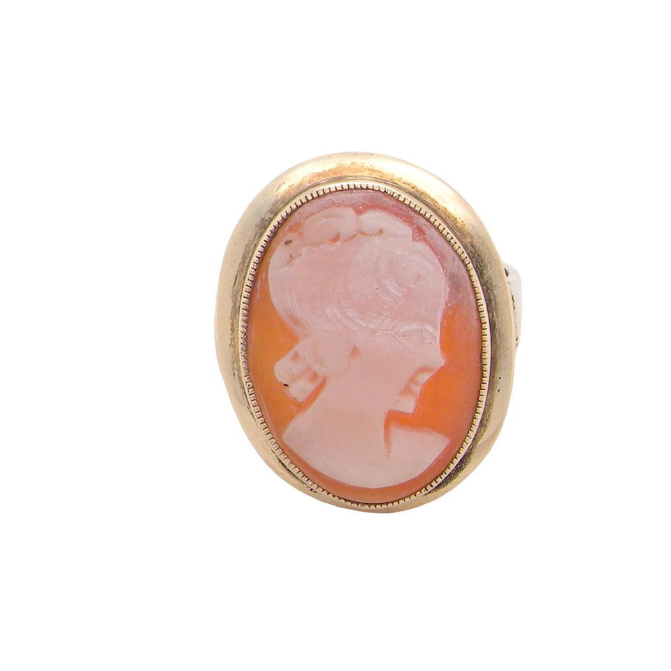 A 9 carat gold dress ring that features a cameo shell. Carved with the head of a young woman. Measures 20x15mm.