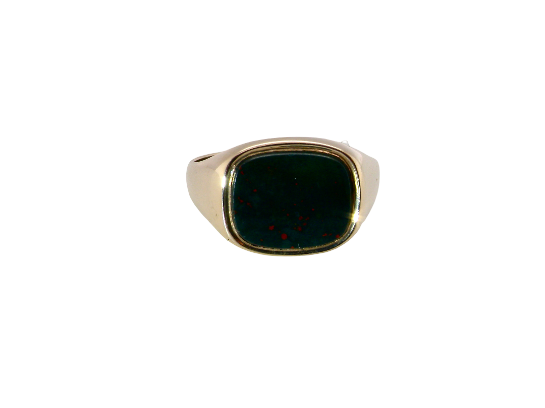 A gold signet ring with a square bezel-set dark green stone containing tiny red flecks, shown on a plain white background.
