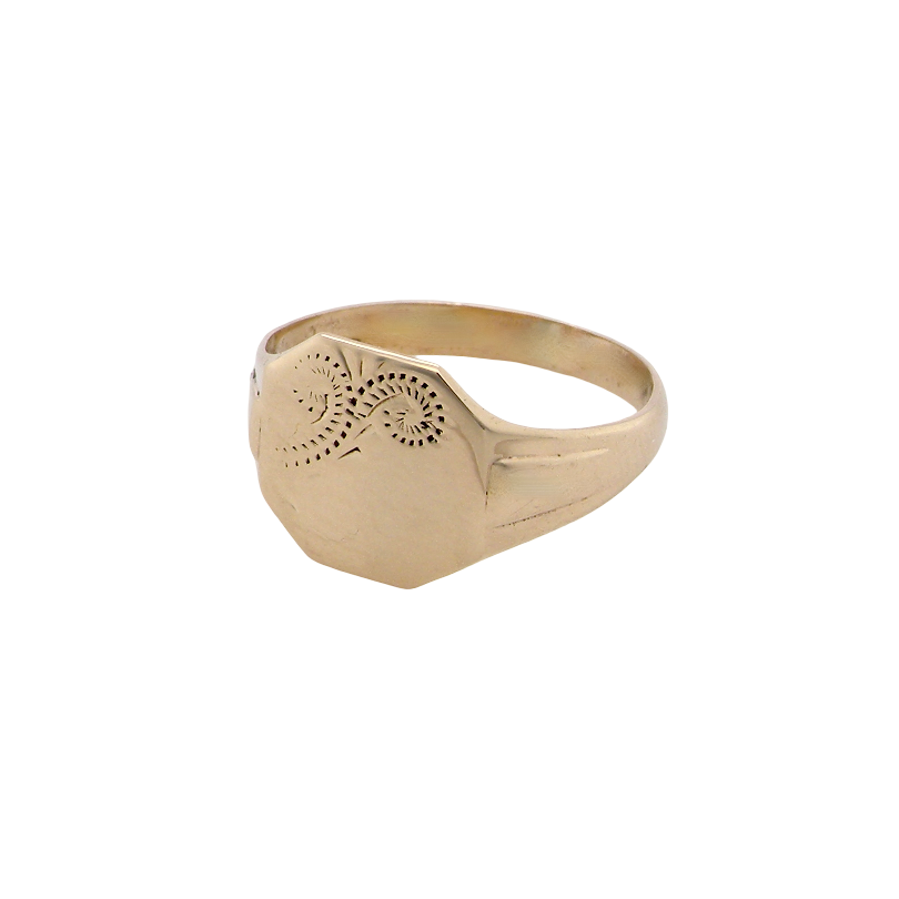 A gold signet ring with a flat, engraved face and a beveled hexagonal shank, shown on a plain white background.