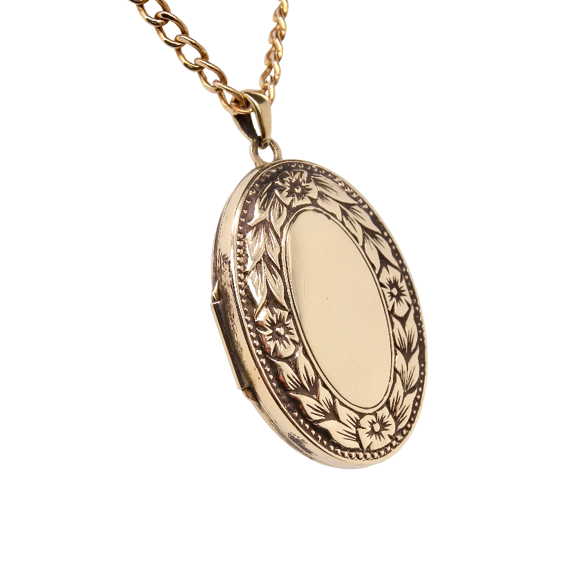 A 9 carat gold locket*, oval shaped, measures 30x20mm, depth 5mm. 