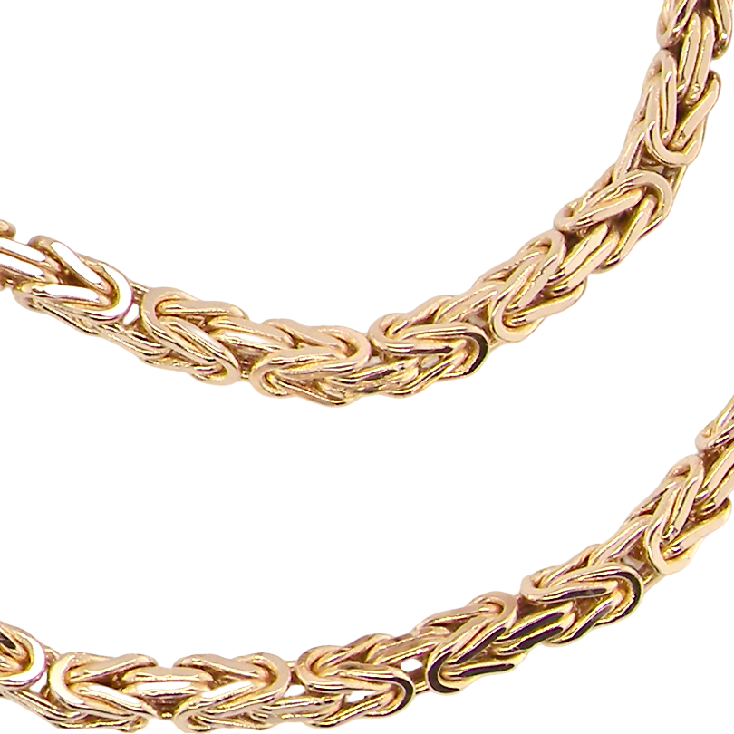A close-up of a gold-toned braided chain necklace on a plain white background.