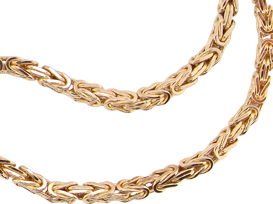 A close-up of a gold-toned braided chain necklace on a plain white background.