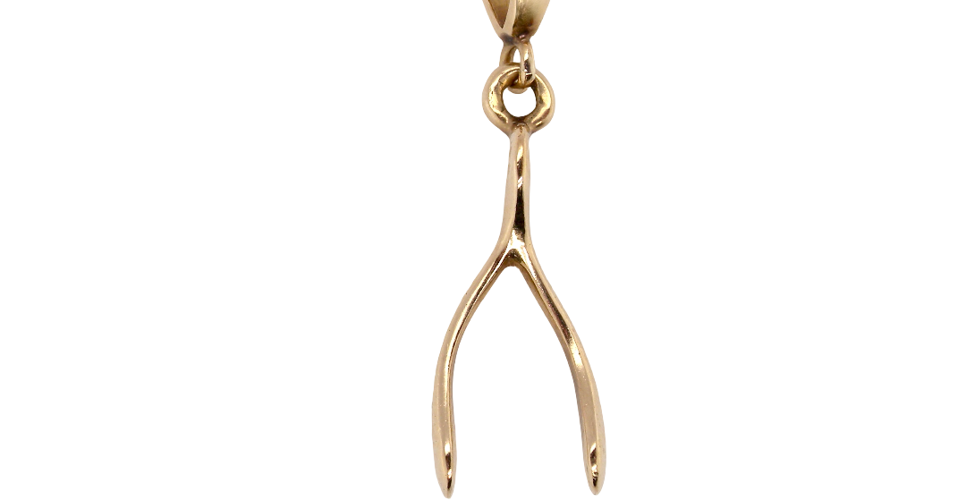 A 9 carat gold pendant (or charm) in the shape of a wishbone.
Overall size 25x10mm, weight 3.1 grams. 