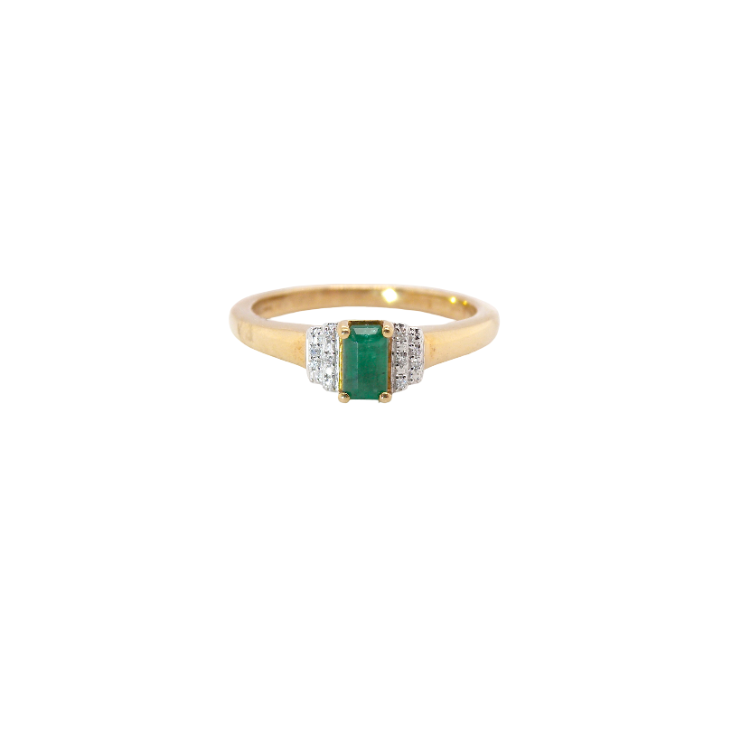 A 9 carat gold ring that features a rectangular cut emerald, 5x3mm (est 0.30 carats)
