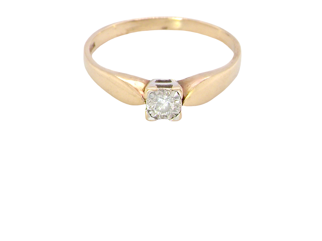 A 9 carat gold solitaire ring. Features a single white diamond 3.4mm
