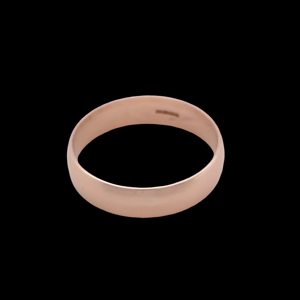 A 9 carat rose gold wedding ring.
Plain D shape