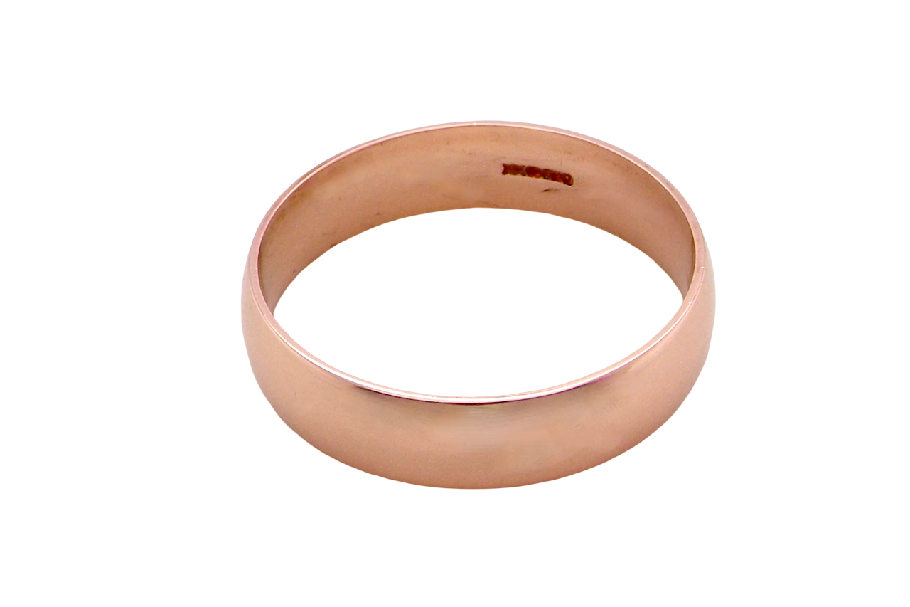 A 9 carat rose gold wedding ring.
Plain D shape profile,