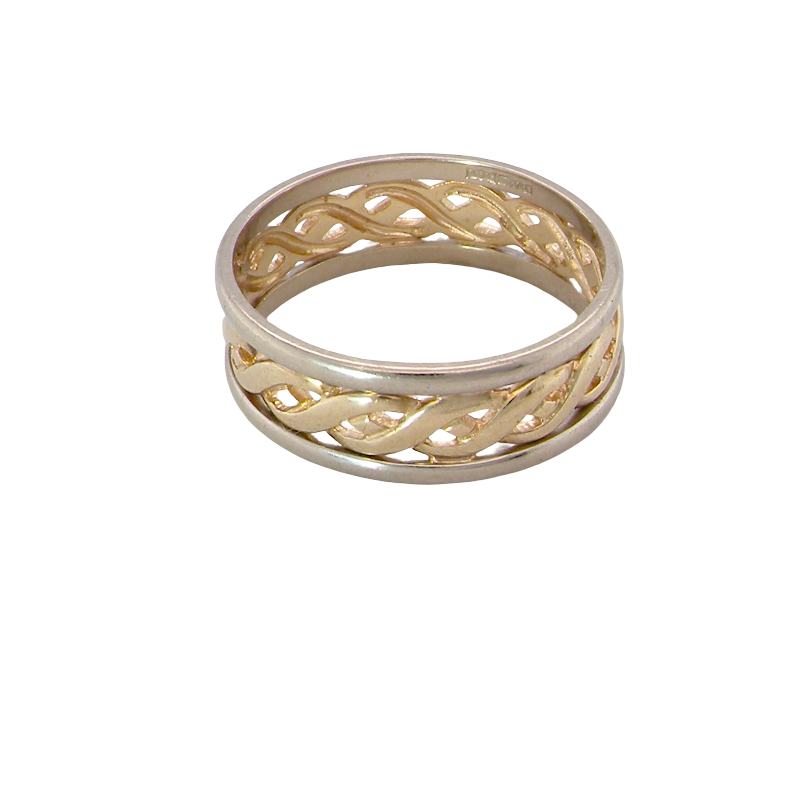 A 9 carat two colour gold ring. The centre band yellow gold, celtic design, the outer rims are white gold. 