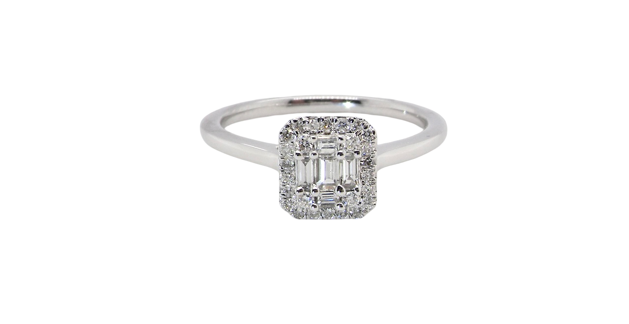 A 9 carat white gold cluster ring. The centre is set with five baguette cut white diamonds, 3 x 2x1.2mm, 2 x 1mm.