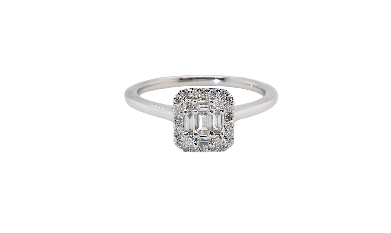 A 9 carat white gold cluster ring. The centre is set with five baguette cut white diamonds, 3 x 2x1.2mm, 2 x 1mm.